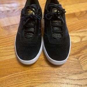 Adidas  Puig Men's Black and Gold Sneakers